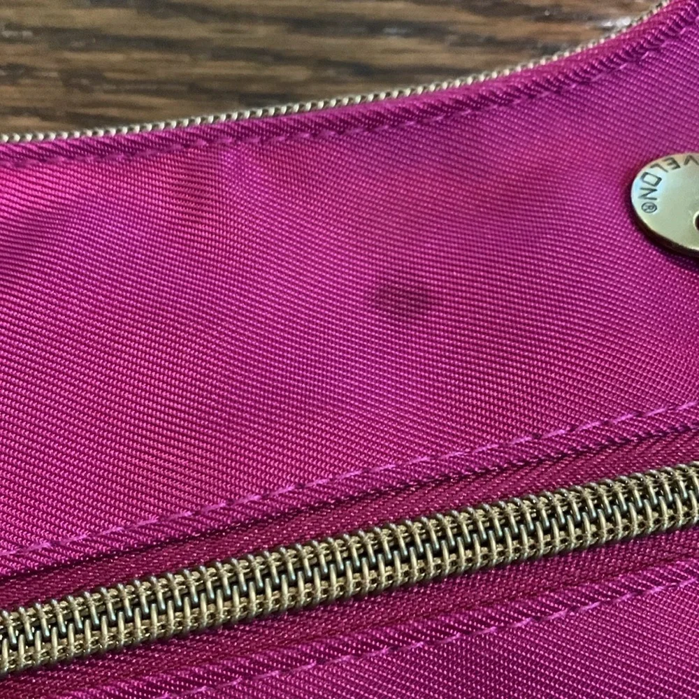 Travelon magenta cloth purse withh adjustable strap